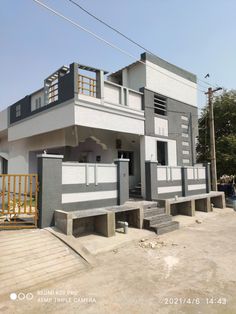 a house that is painted gray and white