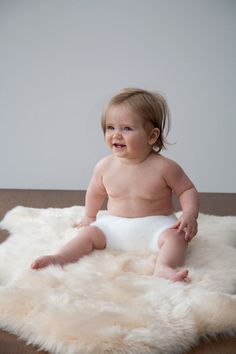 Auskin Luxury Skins Infant Care Long Wool Rug Bone Area main image Lambskin Rug, White Sheepskin Rug, Infant Care, Skin Rugs, Baby Rugs, Animal Hide, Sheep Skin, Sheepskin Rug, House Materials