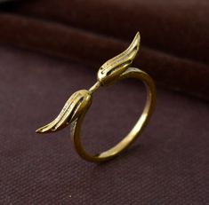 "Angel Wings Rings For Women's, Adjustable Angel Wings Ring, Gold Feather Ring, Eternity Wings Ring, Princess Angel Ring, Promise Ring, gifts IMPORTANT NOTE....👇 free surprise gift on purchase of 1 product. 2 rings free gifts on purchase of 5 products. ❥ Customers' satisfaction is our biggest priority, please contact us with any questions/queries for future or existing orders, and we will do our best to make sure you are happy with your order. ❥Please make sure to add the correct address during Elegant Winged Rings For Gifts, Angel Wing Ring Gold, Elegant Gold Wing-shaped Jewelry, Elegant 14k Gold Wing-shaped Jewelry, Angel Wing Ring, Angel Ring, Angel Wings-shaped Jewelry For Gifts, Gold Angel Wings, Handmade Gold Ring