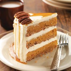 a slice of carrot cake on a white plate