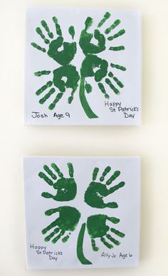 two green handprints on white paper with the words happy father's day