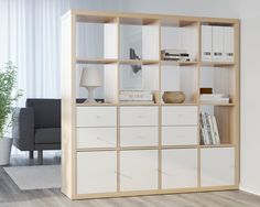 a living room with a book shelf filled with books