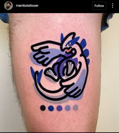 a man with a tattoo on his leg that has an image of a bird in it