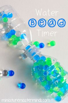 the bead time machine is made out of plastic beads and water beads, which are attached to an inflatable bottle