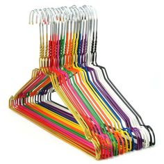 a stack of colorful plastic straws on top of each other in different colors and sizes