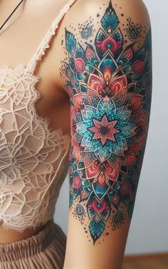 a woman's arm with colorful tattoos on it