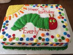 a birthday cake with the very hungry caterpillar on it