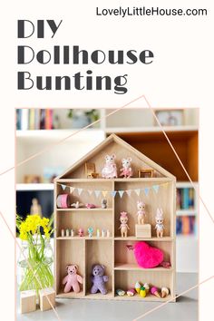 a wooden doll house with the text get a free mini bunting lovely littlehouse