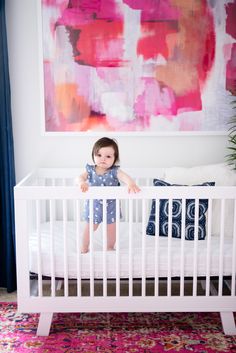 how darling is this modern nursery with midcentury accents? perfect for a fun and bright little girl that could easily grow with the decor Bright Pink Nursery, Science Nursery, Midcentury Dresser, Baby Nursery Girl, Bright Rug, Modern Nurseries, Mid Century Modern Nursery, Mid Century Nursery