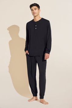 Give him a good night’s sleep, every night. Inspired by our best-selling women’s pajamas, but made just for him, our relaxing men’s PJ’s are cut from the same luxuriously soft and sustainable TENCEL™ Modal fabric. They’re designed to be breathable, long lasting and machine washable. Our relaxed Henry styling combines the classic look of a henley top with casual jogger-style pants for pajamas he’ll want to live in. Not only does it offer all-day comfort at home, but it’s a cozy packing essential Sleepwear For Men, Men Sleepwear, Men's Sleepwear, Rails Clothing, Velvet Clothes, Mens Sleepwear, Modal Fabric, Retro Brand, Casual Joggers