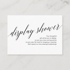 a white business card with the words display shower on it's front