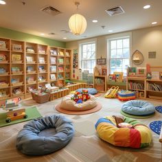 a child's room with lots of books and toys on the floor in it