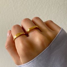 Minimalistic Dainty Bar Ring Characteristic Super Chic On And Looks Amazing Alone Or With Other Rings! High Quality Matte Finishing, Looks Perfectly With Dainty Curved Dainty Band Ring What's It Made Of? 18k Gold E-Plated Titanium, Tarnish Resistant Please Keep Away From Liquid And Chemical Substances Size Us 5- 15.4mm Us 6-16.5mm Us 7- 17.3mm Us 8- 18.2mm Doing A Bundle? Comment An Emoji Under Each One You Like And Message Us To Pop You A Bundle! Get 10% Plus Free Shipping With Bundles Of 3+! O Bar Mini, Silver Eternity Ring, Dainty Wedding Ring, Chemical Substances, Dainty Band, Bar Ring, Blue Stone Ring, Trendy Ring, Luxury Diamonds