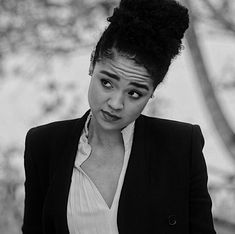 black and white photograph of a woman with an angry look on her face