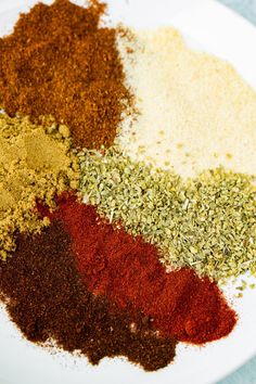 various spices are arranged on a plate to be used as condiments or side dishes