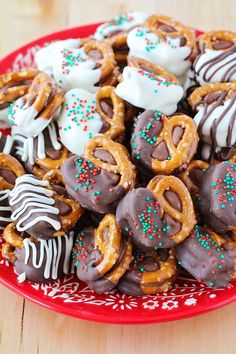 a plate full of pretzels and chocolate covered pretzels