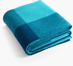 blue towels folded on top of each other