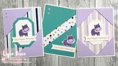 three cards with different animals on them, one is purple and the other is green