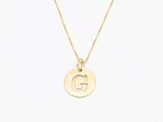 Letter G Gold Pendant made of Gold Vermeil: 18k Gold over Solid 925 Sterling Silver ☞ made to last. Matching Ring & Earrings - please ask me Details :  ♥ Each item comes in a cute GIFT BOX ✓ ♥ GUARANTEE on the materials ✓ ♥ Gold Vermeil: Thickest 3 Micron Gold plate on Solid 925 Sterling Silver ♕ ♥ More Beautiful jewellery on www.etsy.com/shop/AdinaStone ☜    ✉ Shipping by Royal Mail ✉ Tracked Shipping Option - worldwide tracking - choose at checkout: U.K. 1 Day delivery !  USA & Worldwide ✈ 5-7 G Necklace, Gold Letter Pendants, Initial G, Letter Necklace Gold, Gold Pendent, Alphabet Necklace, Ring Matching, Cute Gift Boxes, Gold Disc