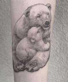 a black and white drawing of a mother bear hugging her baby on the arm,