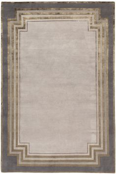 an area rug with a border in grey and beige colors on the bottom half of it