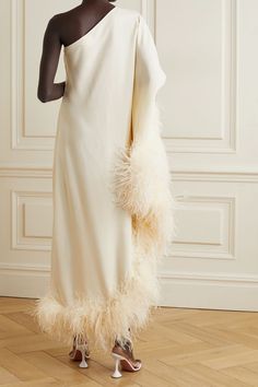 Ivory Ubud one-shoulder feather-trimmed crepe maxi dress | Taller Marmo | NET-A-PORTER Bridal Feather Dress, Elegant Maxi Dress With Feather Trim, Dress With Feathers, Luxury Maxi Dress With Feather Trim, Luxury Feathered Maxi Dress, Feather Top Outfit, One-shoulder Feather Trim Dress, Taller Marmo Feather Dress, Tall Maxi Dress