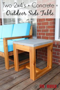 a wooden bench sitting on top of a wooden deck next to a brick building with the words, two 2x4's concrete outdoor side table