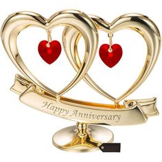 two heart shaped gold anniversary ornament with ribbon