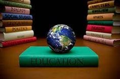 the earth is sitting on top of a book that says education in front of stacks of books