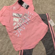 Adidas Girls Workout Outfit. Shirtsleeves And The Pants Are Cropped. Never Worn Pink Stretch Short Sleeve Sets, Casual Adidas Sets For Spring, Pink Short Sleeve Sports Set, Pink Adidas Cotton Set, Adidas Pink Cotton Sets, Adidas Pink Long Sleeve Sets, Adidas Casual Tops For Playwear, Casual Adidas Tops For Playwear, Pink Cotton Adidas Sets