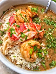 a white bowl filled with shrimp and rice