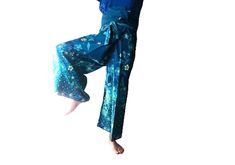 dark blue floral Batik 100% Cotton Handmade cotton casual women's, Thai fisherman pants Size waist 30" wide so fit up to 56" waist 30" leg to waistband Thai fisherman pants offer a combination of comfort, style, versatility, and sustainability. Whether you're looking for casual wear, yoga clothing, or unique fashion items, these pants can be an excellent addition to your wardrobe. Style: With their unique design and vibrant colours and patterns, Batik and floral,Thai fisherman pants are a fashio Thai Fisherman Pants Pattern For Women, Beach Pants With Printed Blue Design, Blue Wide-leg Bohemian Harem Pants, Bohemian Full-length Blue Harem Pants, Pantalon Thai, Blue Cotton Full-length Harem Pants, Thai Fisherman Pants, Yoga Trousers, Fisherman Pants