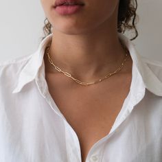 A Beautiful stand-alone paper clip necklace.  This chain is made with a high-quality 14k gold fill. Unlike plated chains, these will not fade or chip. A classic and chic addition to your wardrobe. Details 14k goldfill chain Links measure 3.7mm X 8mm 14k goldfill Spring ring clasp *Model is wearing a 16 inch chain Gold Paper Clip Necklace, Paper Clip Necklace, Gold Link Necklace, Paperclip Necklace, Gold Necklace Simple, Red String Bracelet, Gold Bead Necklace, Gold Bead Bracelets, Ball Necklace