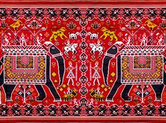 an intricately designed red and black cloth with two elephants in the center, on a white background