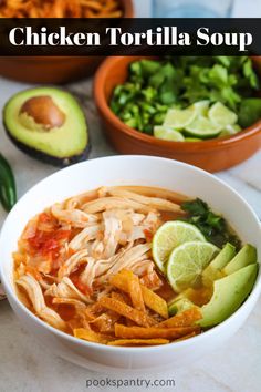 chicken tortilla soup in a bowl with avocado and cilantro