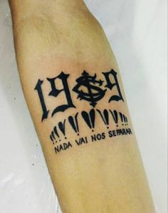 a person with a tattoo on their arm that says, nada vai nos serra