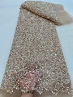 This high quality Fabric is measured in 5 Yards With Embroidered Beading and Sequin. It is soft, very delicate and beautiful. This high Quality Fabric is made with Fashion embroidered rhinestones can be used in making party wedding dresses, skirts, shawls, scarves and other other fashion apparels as you would like. Size : Length : 5 yards (180 inch). Width: 50 inch (Please allow slight deviation for the measurement data ,±1 inch) Material: 100% Polyester, Tulle Lace Fabric, Eco-Friendly embroide Embroidered Net Fabric, Luxury Sequined Dupatta For Festive Occasions, Net Lace Tops, Mens Outdoor Fashion, Rhinestone Fabric, Advanced Embroidery, Raw Silk Fabric, Beading Netting, Beaded Lace Fabric