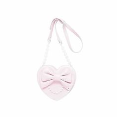 a pink heart shaped purse with a bow