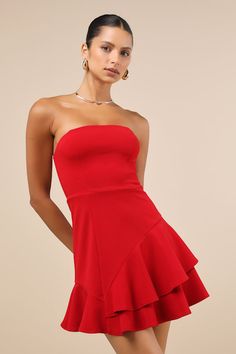 If your goal is to receive as many compliments as possible, then the Lulus Sultry Intentions Red Strapless Ruffled Mini Dress is the perfect option! This flirty lil' dress is composed of stretchy crepe knit that shapes a strapless, princess-seamed bodice (with hidden no-slip strips and supportive side boning) and a straight neckline. The fitted waist tops a figure-skimming, A-line mini skirt adorned with asymmetrical, ruffled tiers. Hidden back zipper/clasp. Fit: This garment fits true to size. Sorority Recruitment Outfits, School Dance Dresses, Ruffled Mini Dress, Red Strapless Dress, A Line Mini Skirt, Straight Neckline, Strapless Mini Dress, Going Out Outfits, Hoco Dresses