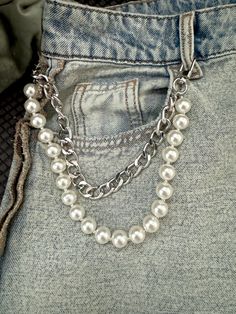 This silver jeans chain is the hot fashion accessories. The 12" lengths belt chain doubles as a bag chain, key chains and mobile phone accessories that will add a touch of elegance to any outfit.  Key Features: - Can be used as a Perl belt chain, bag chain, necklace, mobile phone accessories or keychain - Pearls matches with any outfit - Perfect gift for moms or friends Made with high-quality faux pearl beads and silver plated materials, this Pearl jeans belt is durable and long-lasting. It's the perfect addition to your collection of fashion accessories and also makes for an excellent gift option goes with transparent mobile phone hook Beaded Belt Chain, Keychain Pearls, Diy Chain Belt, Streamer Awards, Belt Chains, Pearl Jeans, Pearl Keychain, Chain Outfit, Chain Jeans