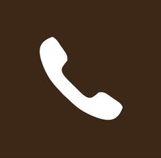 a white phone icon on a brown background