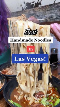 someone holding up noodles in las vegas with the caption best handmade noodles in las vegas