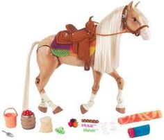 a toy horse with saddle and accessories