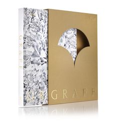 the packaging design for graff's new diamond collection is gold and white, with an intricate cutout in the middle