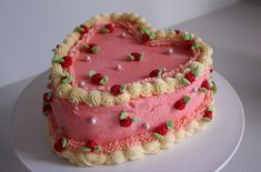 a heart shaped cake on a white plate