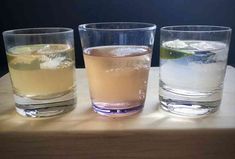 three glasses filled with different types of drinks