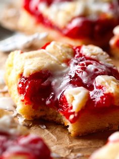 strawberry shortcakes with cream cheese filling on a cutting board