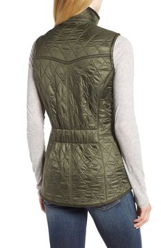 Diamond quilting adds subtle texture to a sleek nylon vest featuring cozy fleece lining and tonal logo embroidery at the pockets. 26 1/2" front length; 29" back length Front zip closure with snap placket Stand collar Dual-entry hand-warmer pockets Fleece lining, with synthetic fill 100% polyamide Machine wash, dry flat Imported Women's Clothing Diy Tumblr, Makeup Portfolio, Quilted Vest, Diamond Quilt, Urban Outfits, Logo Embroidery, Quilted Jacket, Urban Art, Embroidery Logo