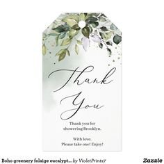 a thank card with watercolor leaves on it