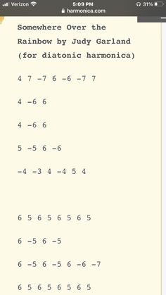 an iphone screen with the text somewhere over the rainbow by july garland for diastic harmonica